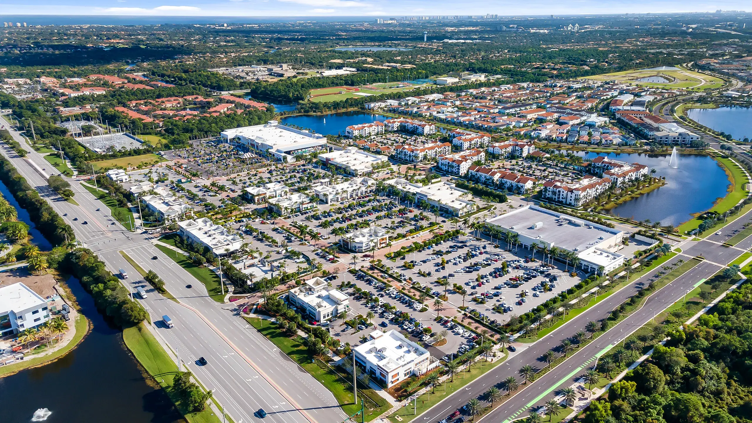 daytime aerial image of alton town center showing the shopping center and the main intersection