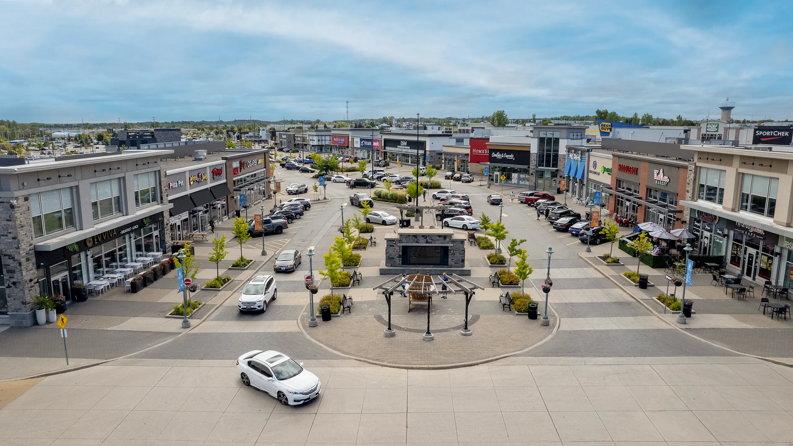 daytime aerial image of the food district at park place