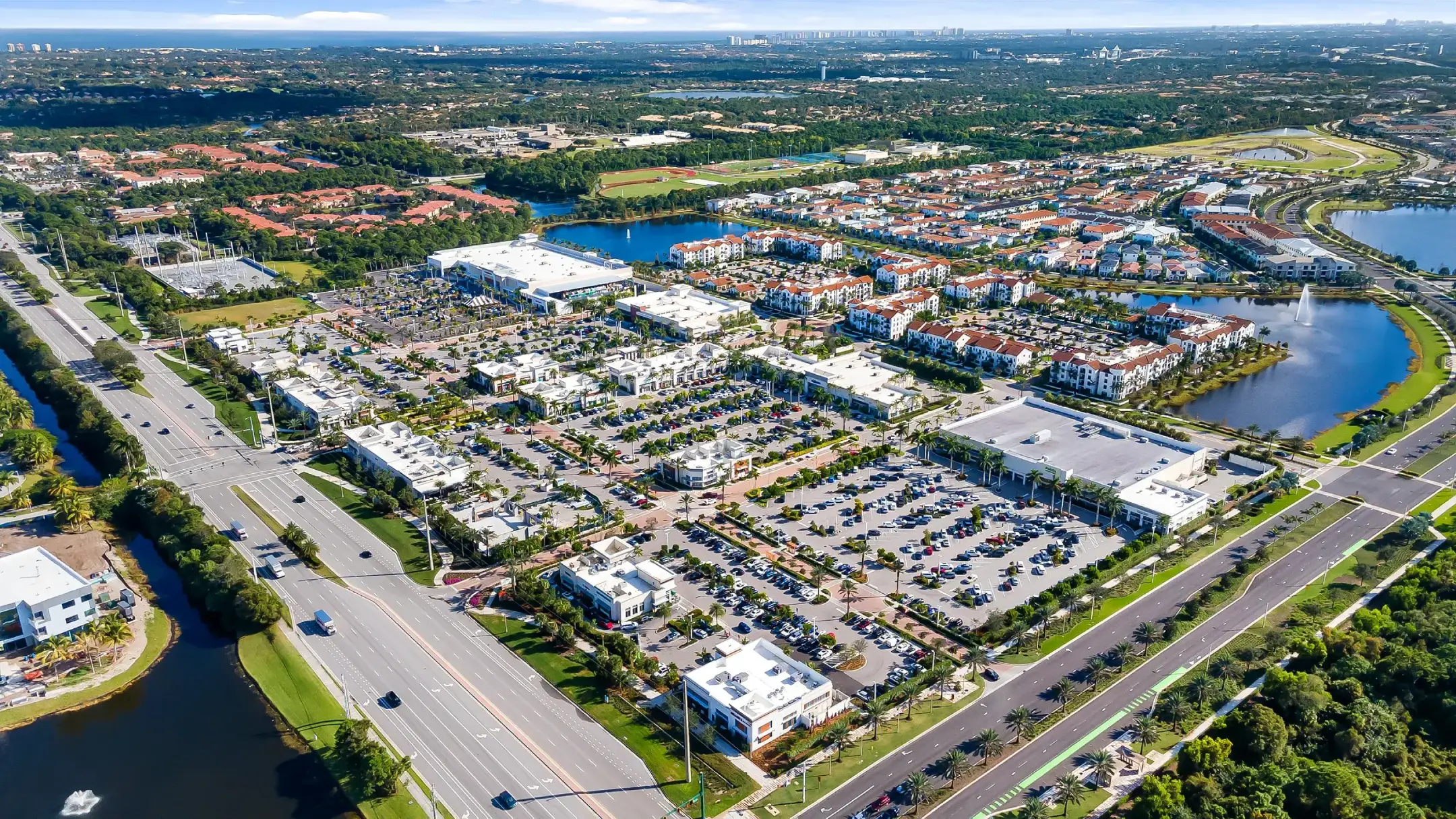daytime aerial image of alton town center showing the shopping center and the main intersection
