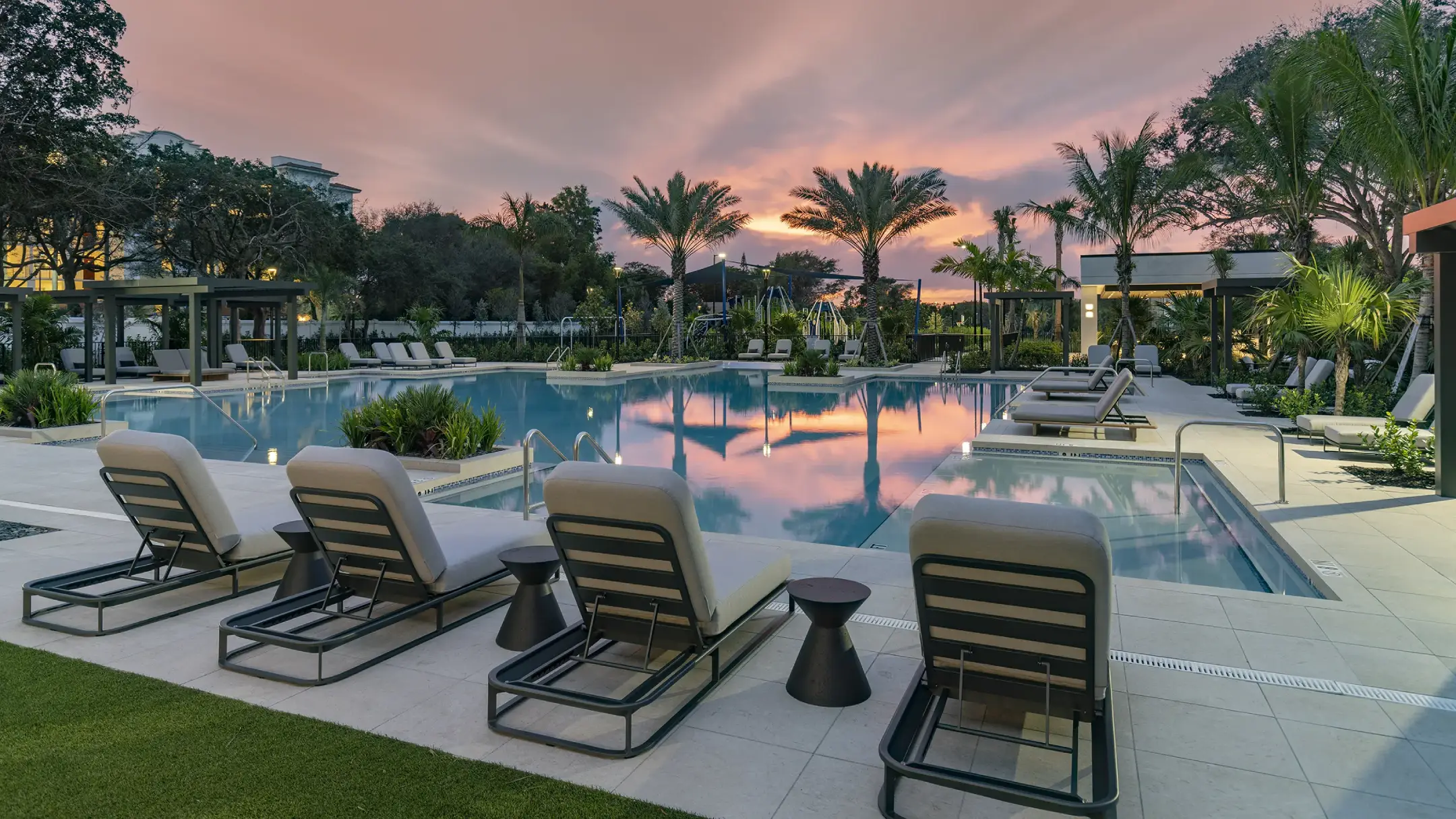 poolside photo of clubhouse at nuvo boca