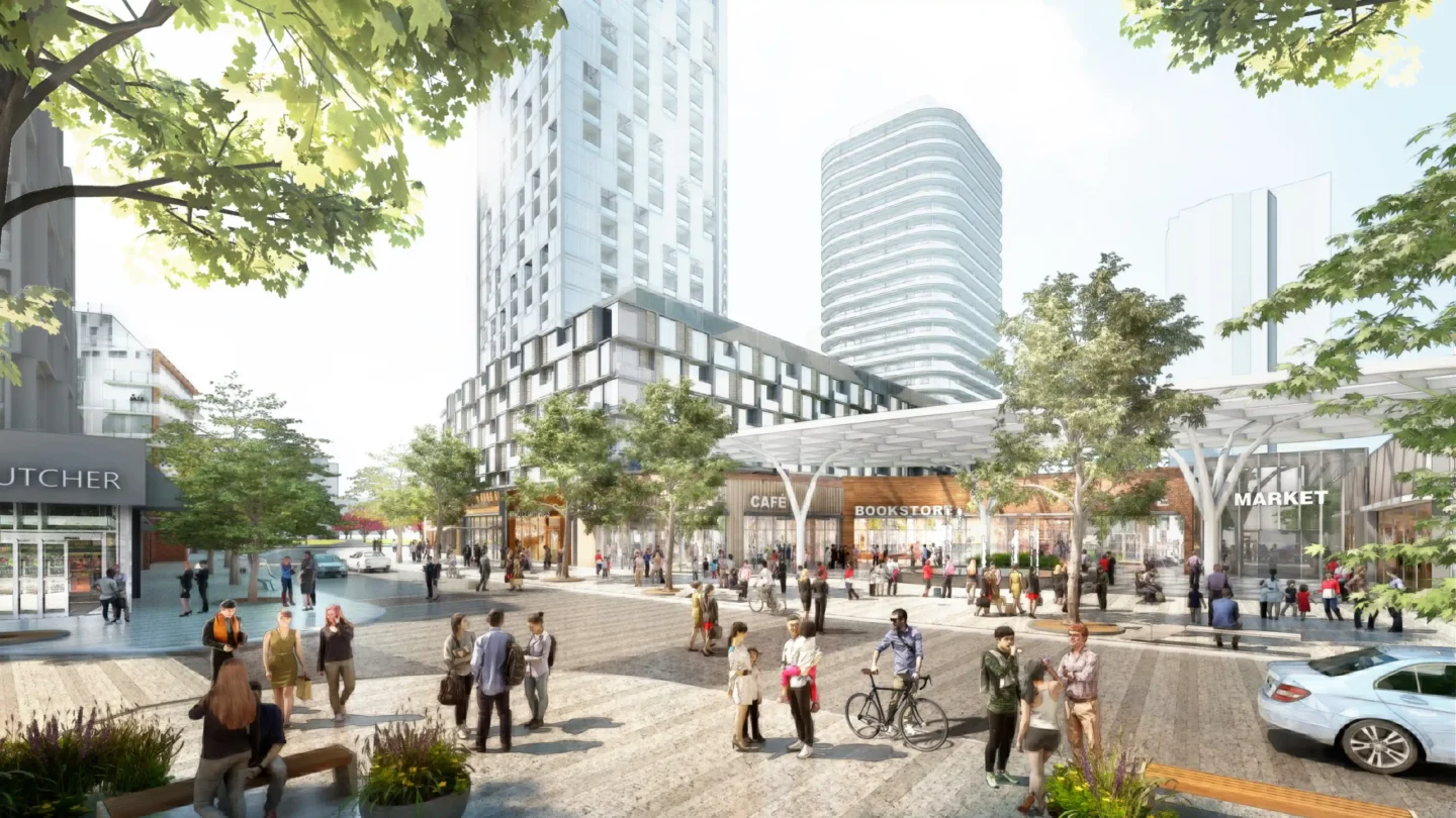 A bright, bustling pedestrian plaza surrounded by modern mid- and high-rise buildings. The scene includes a diverse group of people walking, talking, and cycling in a vibrant public space. Prominent storefronts labeled “Café,” “Bookstore,” and “Market” line the street, with trees and landscaping adding greenery throughout. A modern canopy structure provides partial cover along the walkway. The architecture is sleek and contemporary, emphasizing glass, natural light, and accessibility. A car is parked on the right side of the image, reinforcing the integration of pedestrian and vehicle access.
