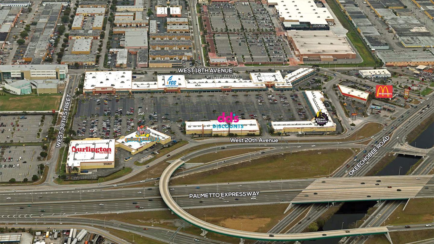 Labeled aerial view of Westland Promenade highlighting major tenants such as dd’s DISCOUNTS, Burlington, Chuck E. Cheese’s, Planet Fitness, and McDonald’s. Major surrounding roads including Palmetto Expressway and Okeechobee Road are labeled, along with adjacent neighborhoods and commercial zones.