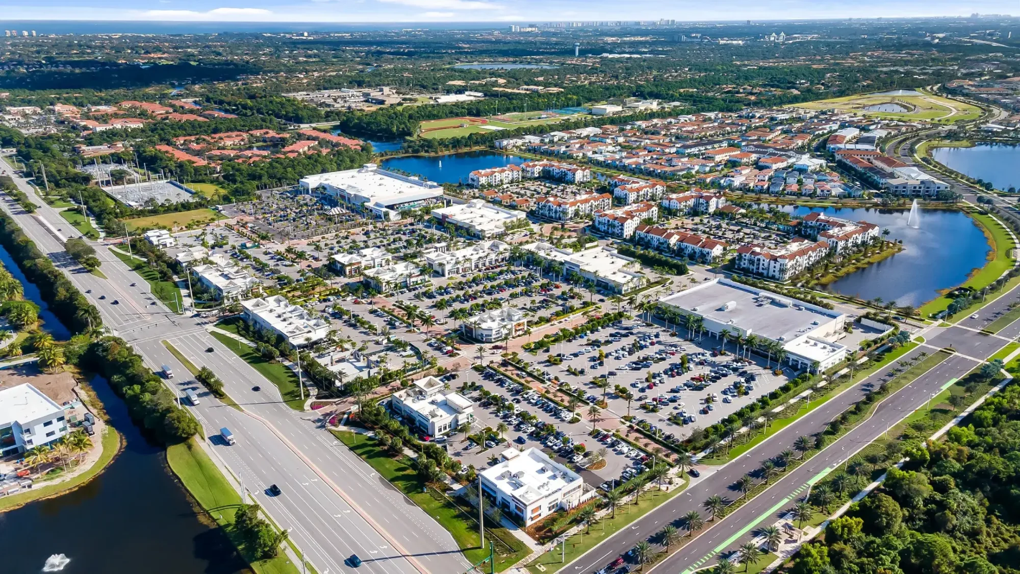 daytime aerial image of alton town center showing the shopping center and the main intersection